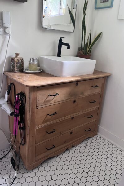 Vintage pine dresser before being converted into a bathroom vanity.
